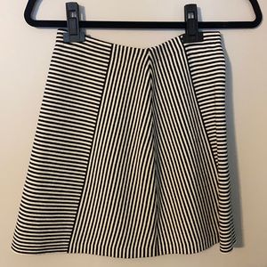 Super cute skirt with elastic waist bank. Spandex